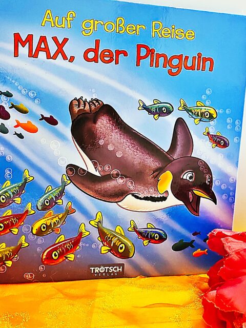 Auf großer Reise Max der Pinguin